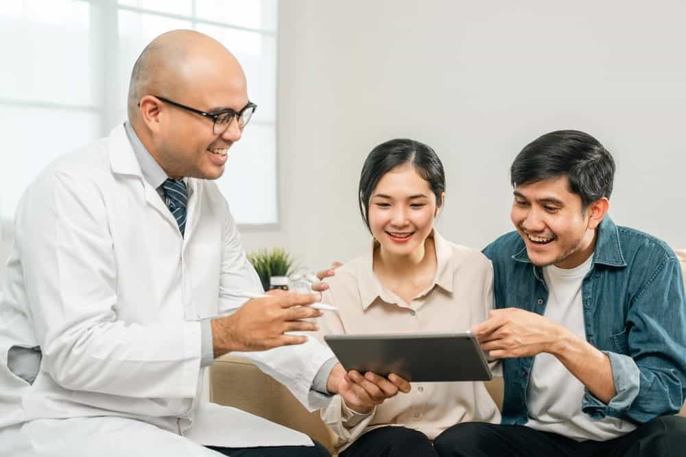 A family discussing adenomyosis treatment options with a doctor 