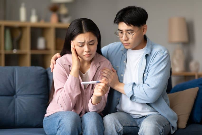 Couple contemplating ways to increase IUI success.